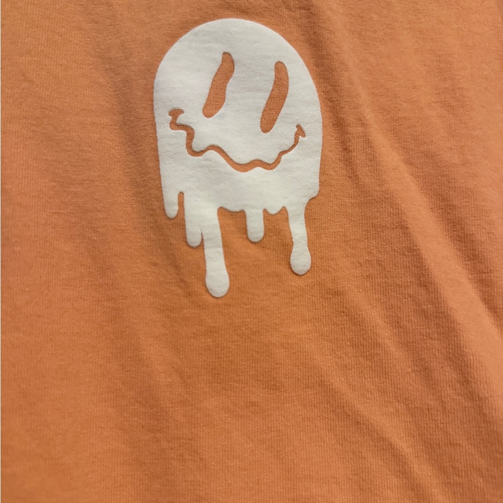 Orange Tee with Dripping Smiley Graphic